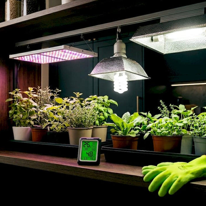 Indoor gardening shelf with three grow light types